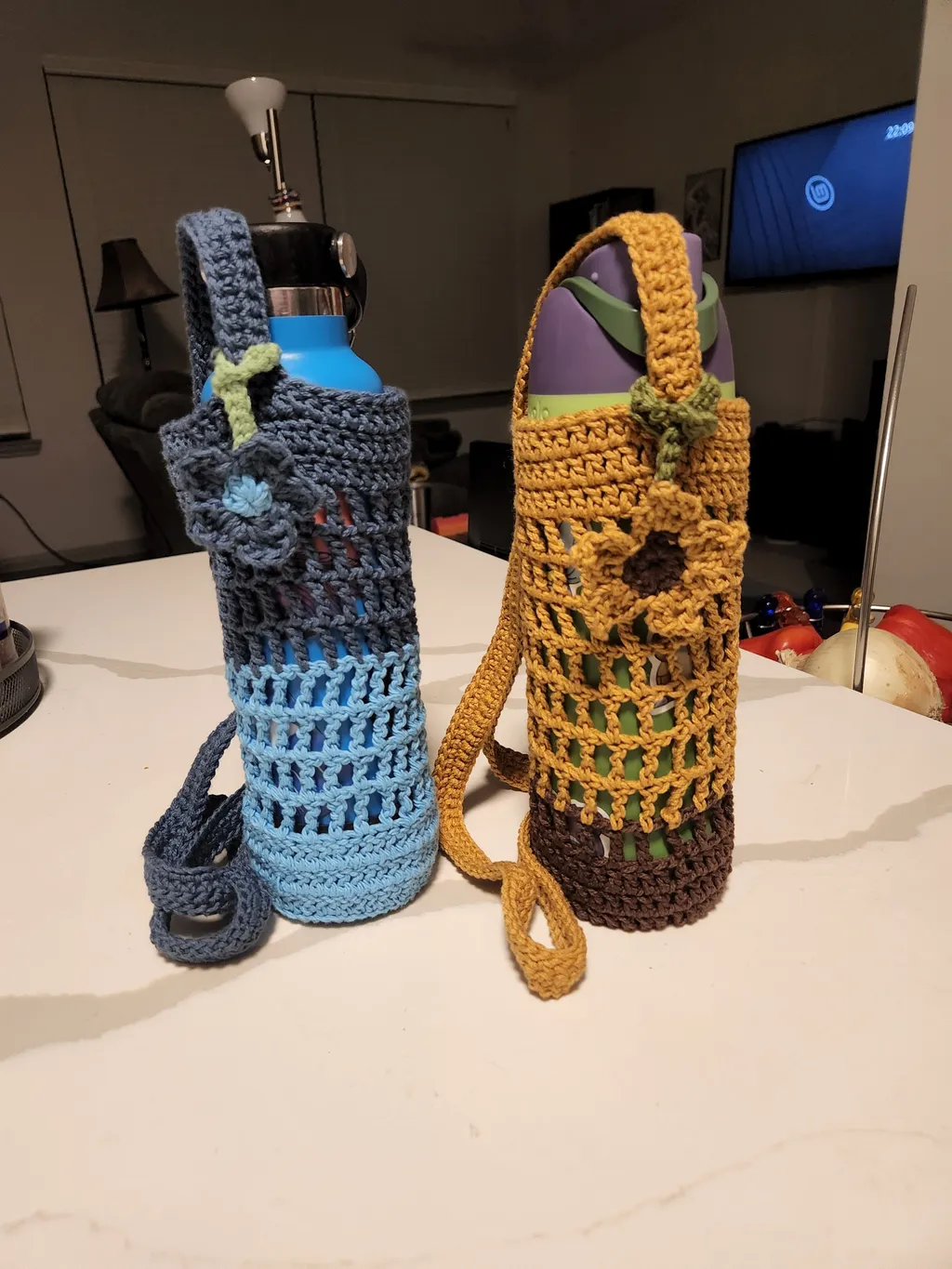 Water bottle holders with flower charms